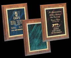 A set of plaques with wooden frames